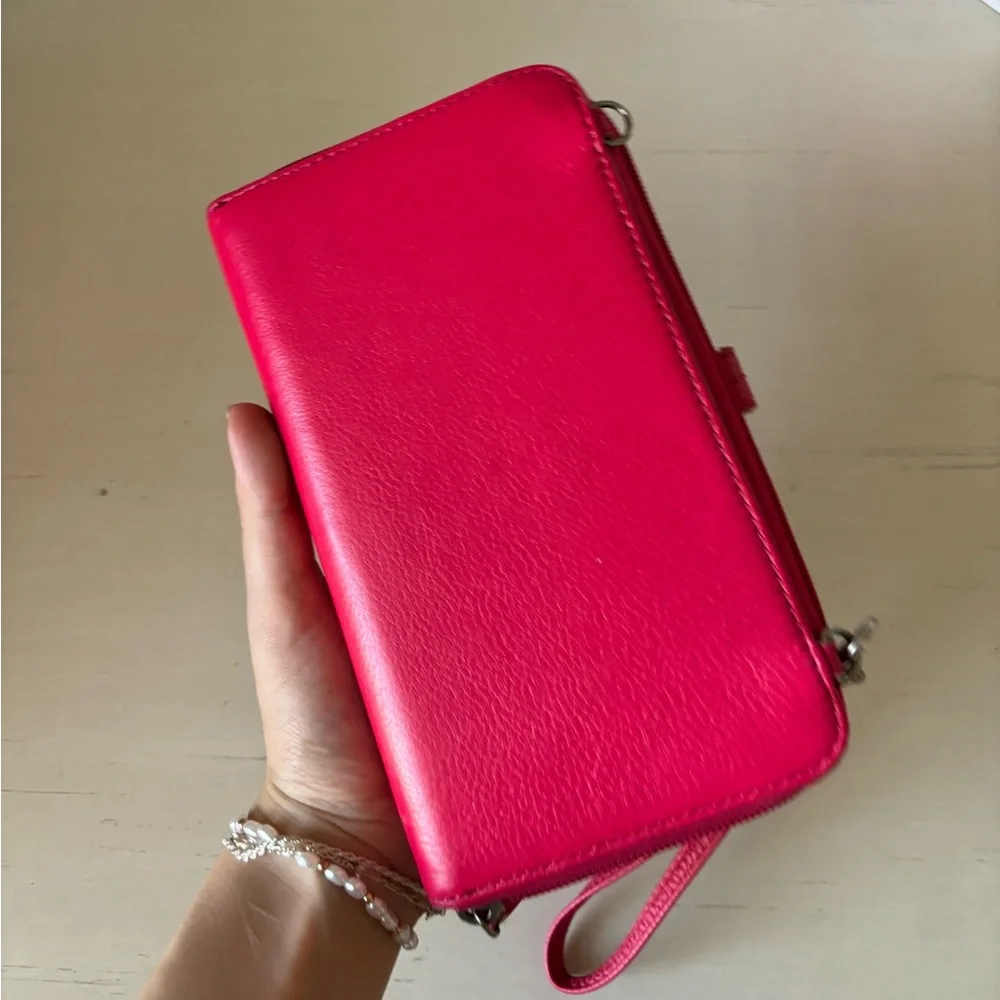 the Sak Iris Smartphone Wallet fuchsia pink
